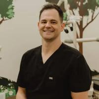 Logo - Dr. John William Collins